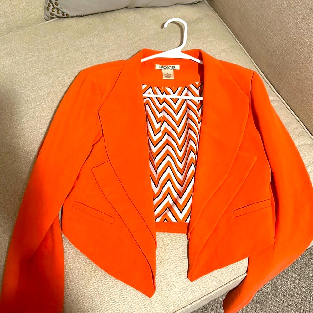 Arden B. Orange blazer.